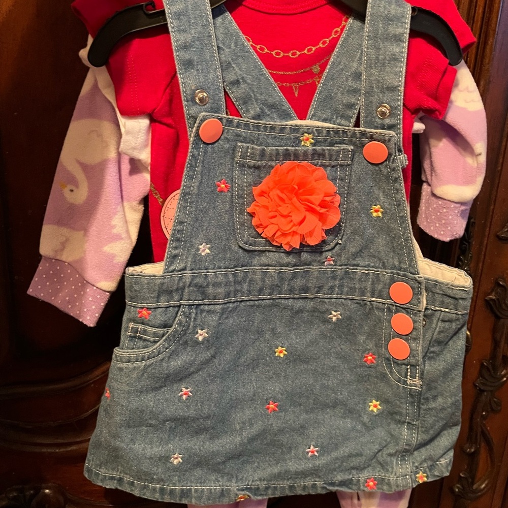 A bundle of baby girl clothes and sandals  3-6 months